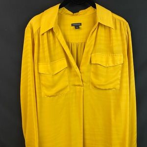 Ann Taylor camp shirt. Yellow animal print (barely visible)